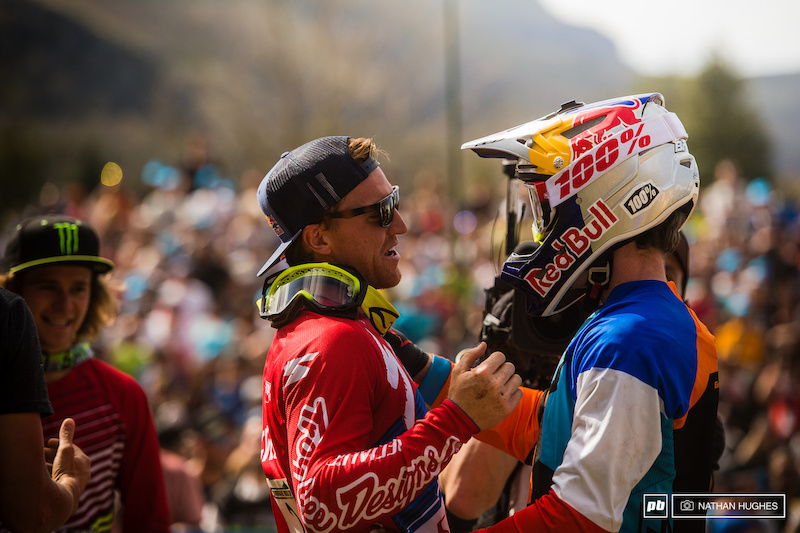 Bruni congratulates Gwin on one unbelievable ride in front of the packed grandstand of downhill fans.