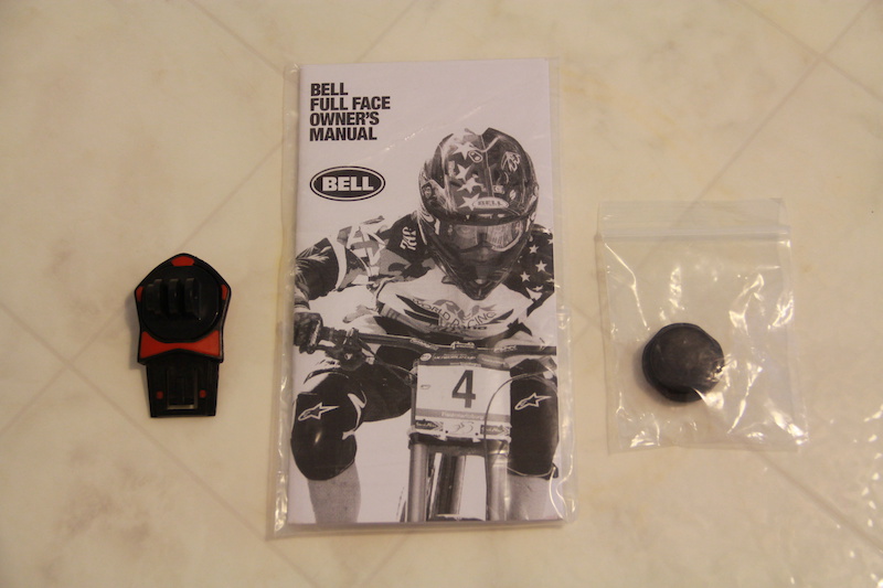 Owners manual and helmet camera mount.
