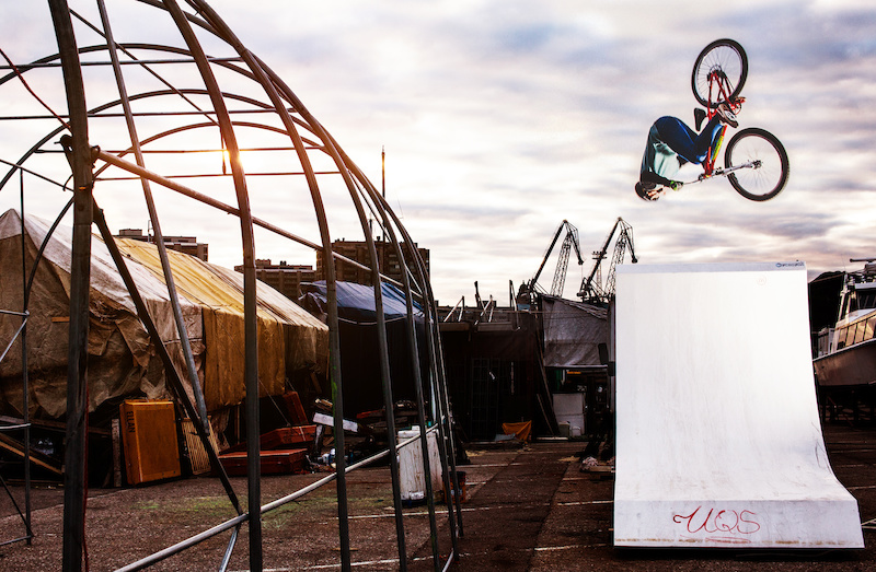 This plastic wakeboarding quarterpipe was serving bike riders during the off season. Antti stomping a flair here during the sunset while Teemu Lautamies Creative captured the action!