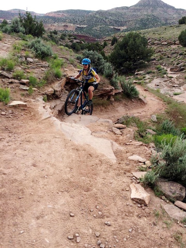 Just climbing up some slick rock in Loma, CO and having a blast!!!