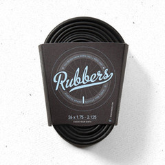Rubbers was created with a little fun in mind, minimal packaging for less waste and a tapered design so it slides right into your bag or jersey pocket. Plus, every one comes with a handy patch kit. 
Inner tubes are the unsung heroes of every bike shop and tool kit. So wy do they sit on half-hidden shelves, stuffed into ugly boxes, ignored until they're needed? And when you need one, it's a capital "N" kinda need.
No matter what size you need we have you covered: