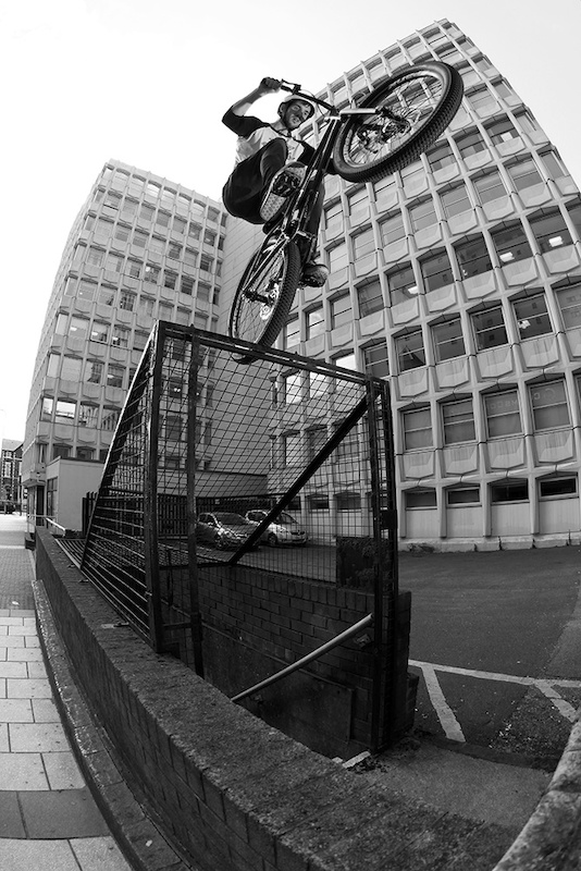 Backwheeling a sketchy mesh roof, before gapping out of frame.
