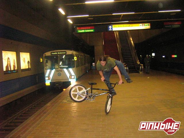 Popin' a foot jam whip on my 87' Haro Sport in front of the subway train.
