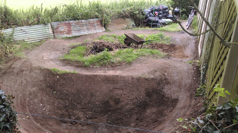Backyard Pumptrack at my buddy's house. Big plans for this space next summer