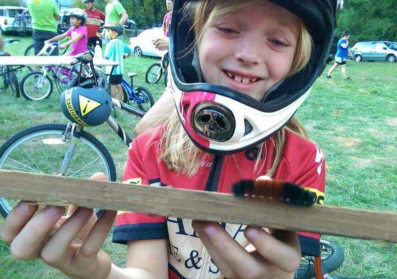 Emily's favorite part of Camas Bikes event Take a Kid Mountain Biking Day was the woolly bear she befriended along the trail.