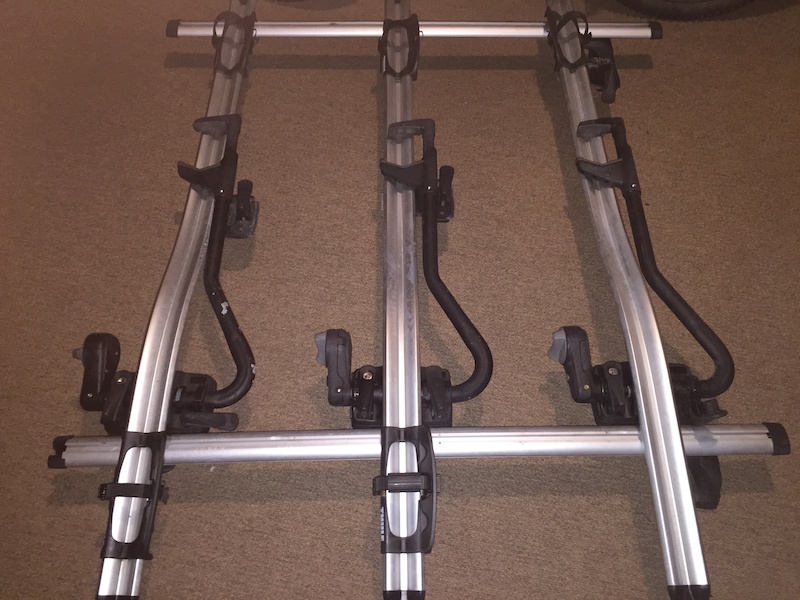 Thule roof rack and bike carriers For Sale