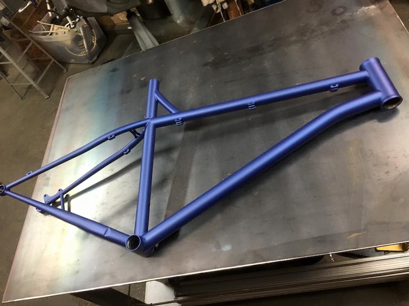 Fresh out of powder coat...Too bad I screwed up and it ended up with a 60 degree head tube.  Oh well! Nothing a milling machine can't fix!