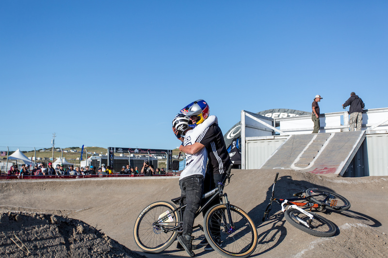 Barry Nobles, embraces the winner of today's Pump Track Invitational.  Nobles, who was the raining champion, lost by a narrow margin and finished in 2nd in the Pro Men's event.