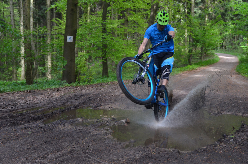 A puddle splash to rinse the dust off the bike