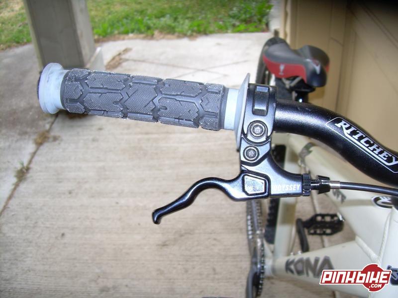 ruffian grips and oddysey brake lever, very nice!!! also, ritchey extreme condition bars. thick and strong!