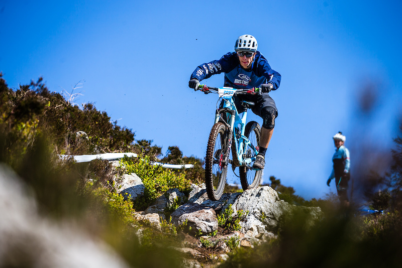 Pedro easily weaving his way through the many rocks on course
