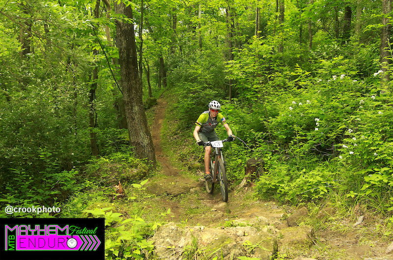 A ride rumbles through a rock garden on the fourth stage of the five-stage Mayhem Enduro in Cumberland Ohio on May 29 2016.