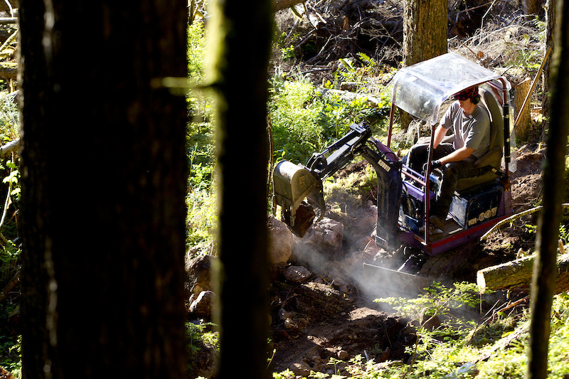 Ted Tempany building another trail in Squamish with the Mini Excavator.
Photographer: John Gibson