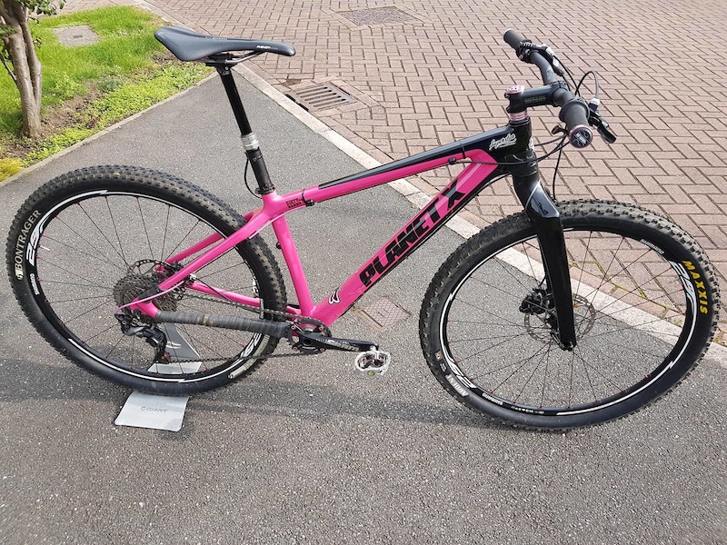 pink planet x bike