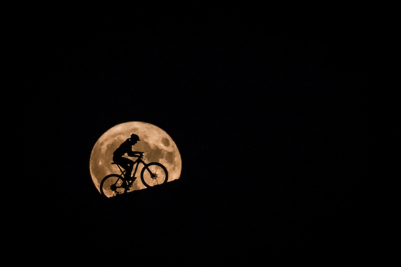 Karla Stepanova climbing a hill in the super moon light.