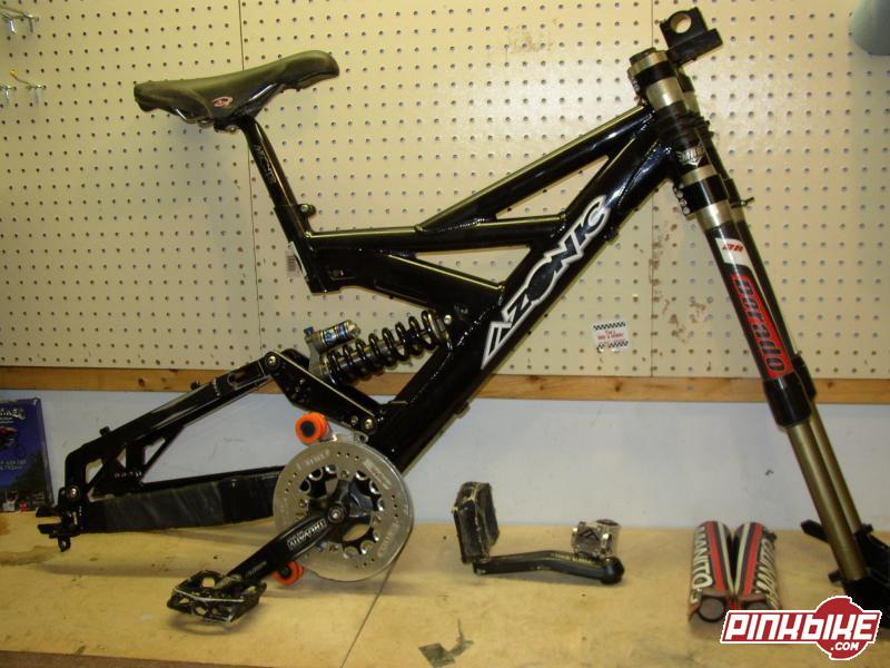 HEY I AM SELLING MY 2003 AZONIC ELIMINATOR FRAME WITH BRAND NEW FOX VANILLA RC. THE FRAME USUALLY COMES WITH ROMIC. IT COMES WITH A MANITOU DORADO(REBUILT) AND THE INTEGRATED STEM AND A GAZZOLADI 3.0 WITH ABOUT 80% OF THE TREAD LEFT. IN THE PICTURE IS MY FRIENDS AZONIC FRAME BECASUE HE WAS SELLING IT WITH THIS DORADO BUT I AM SELING MINE NOW DUE TO SNOWBOARDING. MINE IS IN WAY BETTER CONDITION THAN THE ONE IN THE PICTURE. EMAIL ME IF YOU WANT MORE PICS OF THE DORADO OR FRAME. FRAME I AM SELLING IS IN WAY BETTER CONDITION. WILL SELL DORADO FOR 850 AND THE FRAME FOR 750 IF YOU DONT WANT ONE OR THE OTHER. BUYER PAYS SHIPPING. DORADO JUST REBUILT TO PERFECTION!..YOU DONT GET EVERYTHING THATS IN THE PICTURE,--