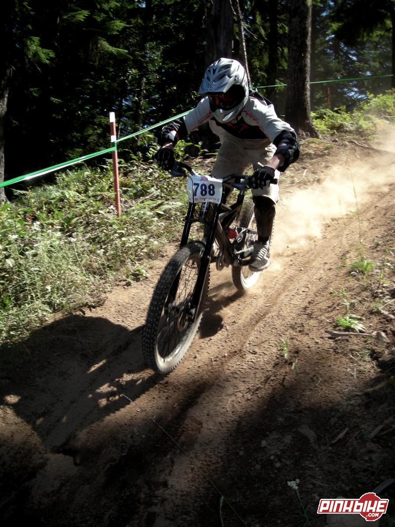 My little buddy in his first DH racec earning a 2nd place podium. I see many more in his future............