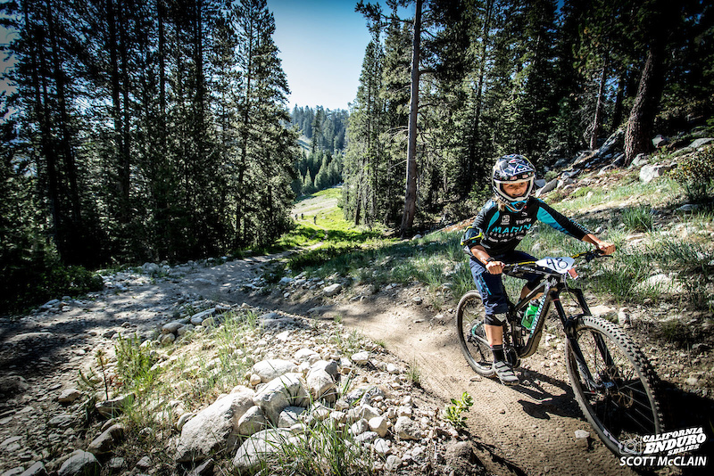 Janea Perry Marin smiling through the grind as she heads to her first stage of the day. Perry fought her way to Pro Women second place and retains the top spot on the series leaderboard.