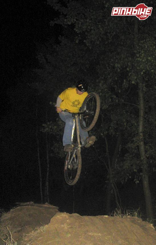 Trying to kiss my front tire in the darkness.  "Kiss of Death", but not extended. I'll add no hander next time ;)