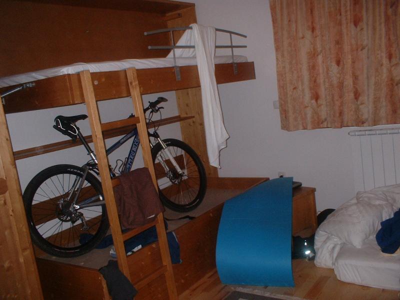 Bunk beds are made for two.  Bike in the bed, rider on the floor.