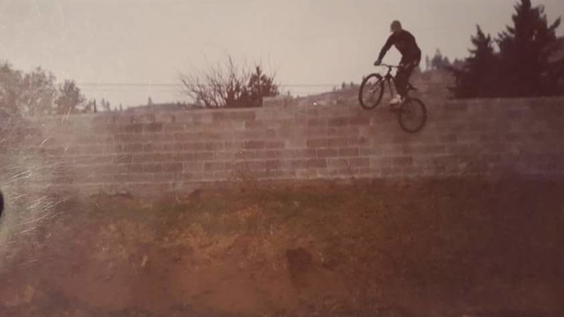 Wheelie dropping off this brick wall on my Kona Scab!