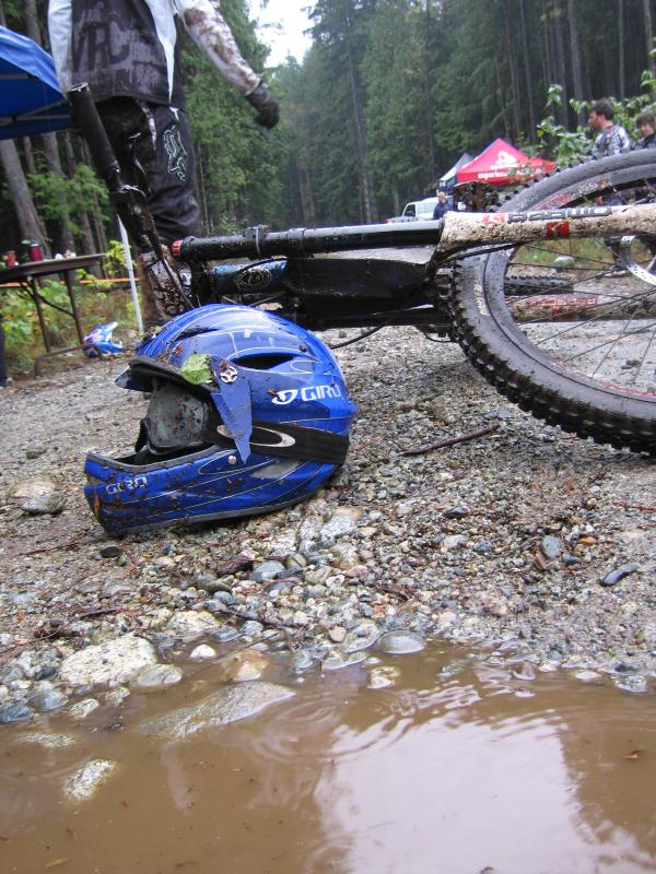 This picture kinda sums up the race.  Puddles, broken visors (every rider crashed or had numerous dabs) and bikes.