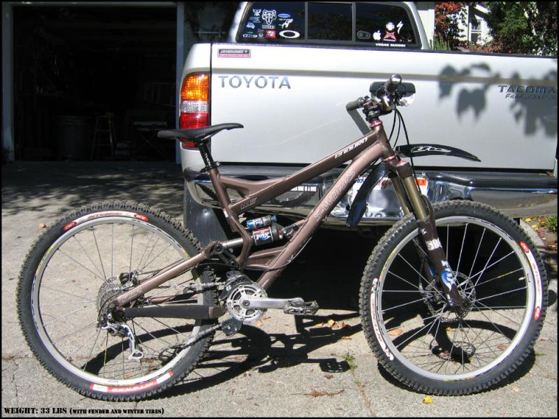 2007 Specialized Enduro S-Works, new 2008 Shimano XT "Shadow" medium-cage derailleur, Intense dual compound FRO 26x2.35 tires, THE DH fender, WTB Silverado Team saddle.