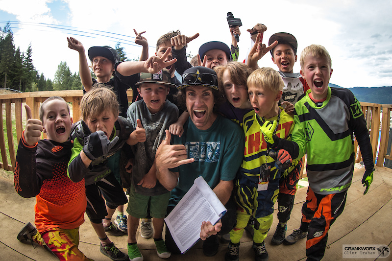 Cam McCaul poses with a group of kids at the Kidsworx B-Line race during Crankworx Whistler in British Columbia (Photo by clint trahan/crankworx)