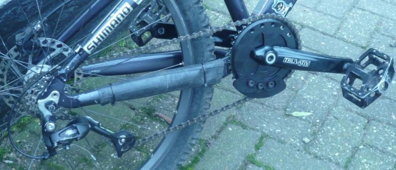 drive train bmx crank with singlespeed chain and 4 gears at the back