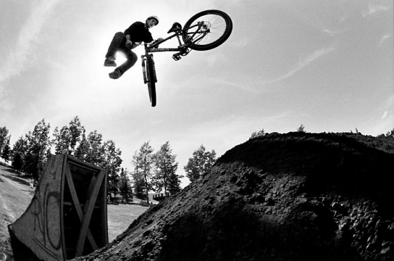 Jesse with a tailwhip and the Millwoods Canada day bike demo