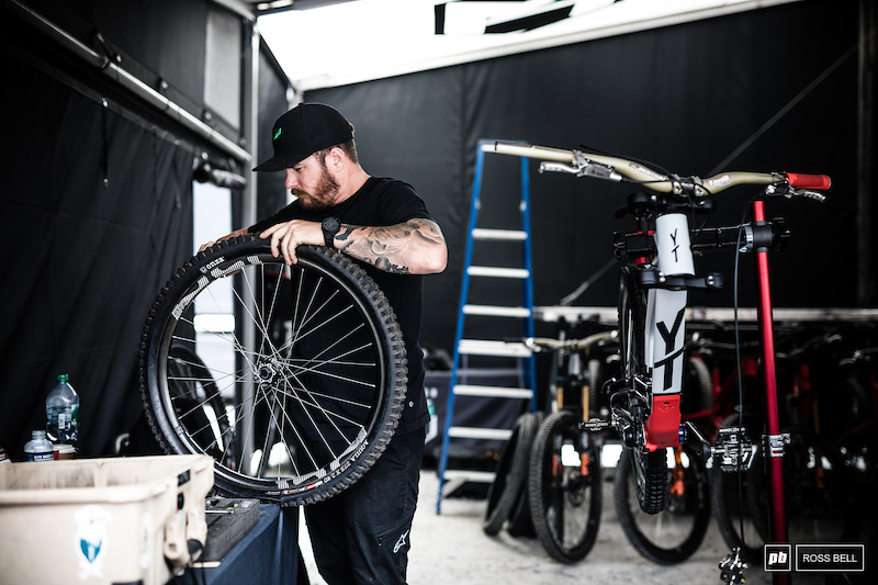 John Hall prepping wheels and tires for Aaron Gwin.