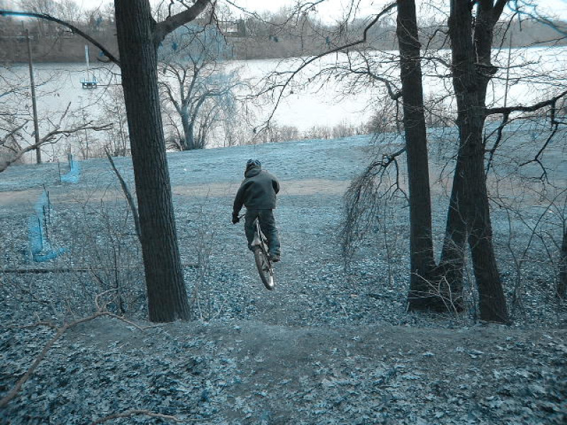 Dan airin the hill gap today with a nice blue effect thrown in ( St. Catharines Trials & Freeride Crew - http://sctfc.cjb.net )