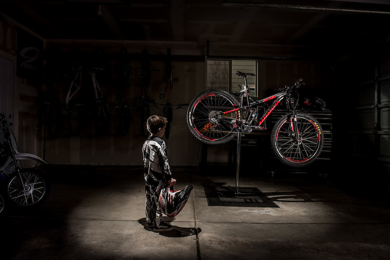 This was a concept put together to illustrate the concept of "Dream Big" and showed a young boy dressed in DH kit looking at his dad's bike.