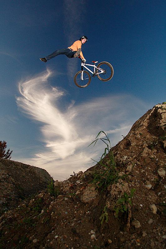 One of the last sessions of the year, Andi throws a tailwhip over his home trails.