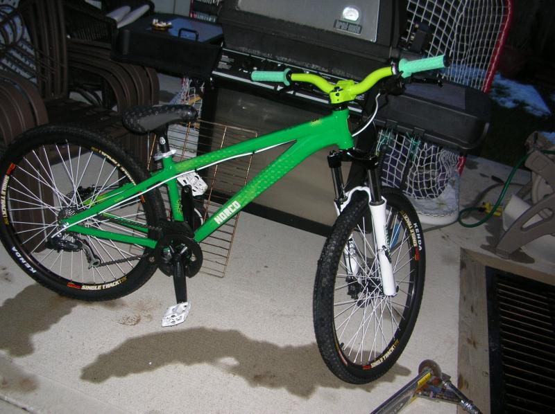 2008 norco 125 white dj2 and green funn bars