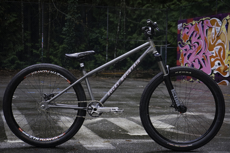 Rocky Mountain Flow size L Custom retro graphics raw paint w clear coat. Flow EX rims King Rr hub Hope PR2 Ff. Argyle Fork Shimano Deore brake XTR cranks 34 - 16T Chromag Bar seat clamp pedals Raceface post Kenda Small block 8 tires 26.5lbs