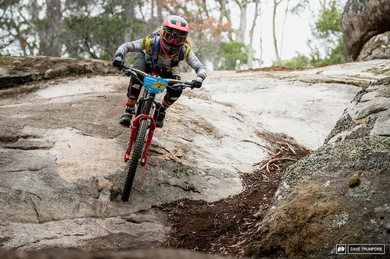 Series leader Isabeau Courdurier on one of the many many rock slabs found out on track in Tasmania.