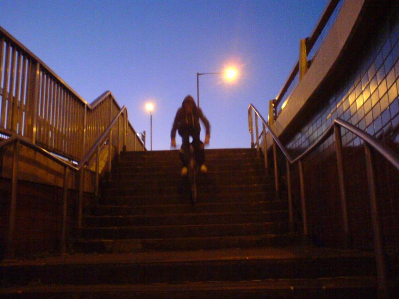 jim coming down the subway steps on my small bmx