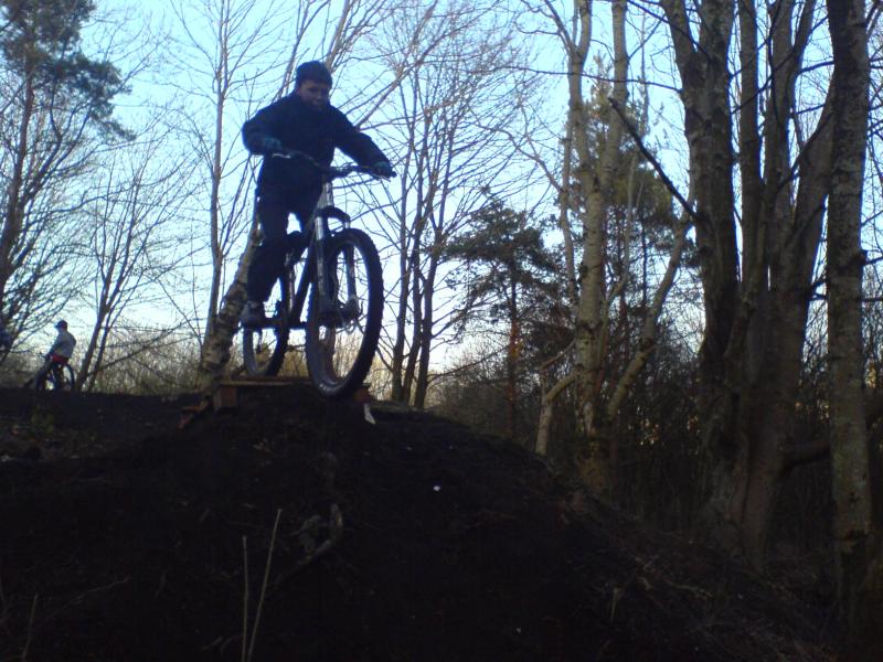 lee doing a drop in the forest