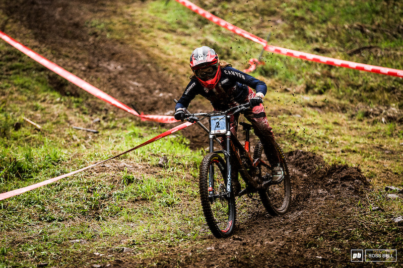 Anna Newkirk looked at ease as the bike squirmed beneath her in the greasy conditions.