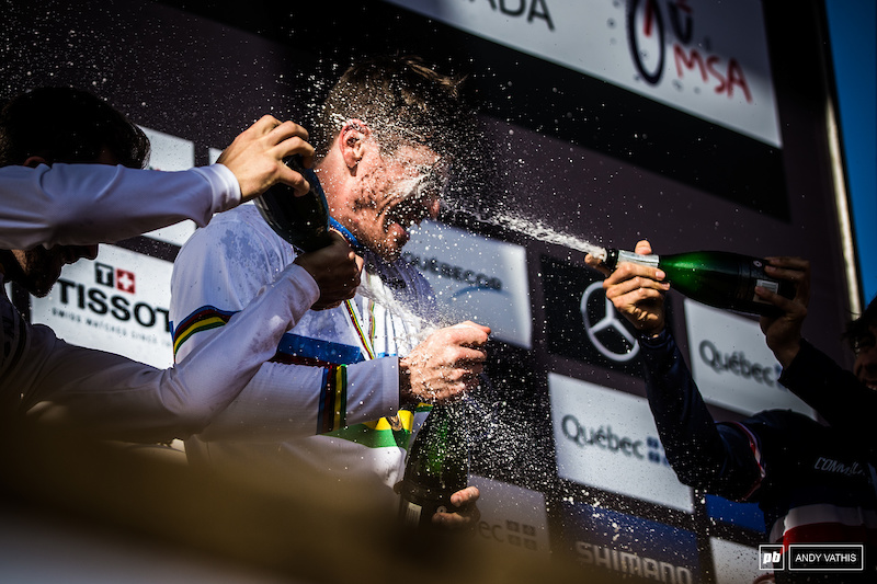 Bruni Powerwashed with champagne before he can even pop his own.