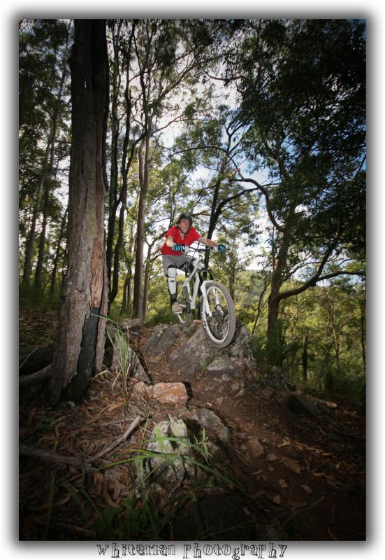 Stu bring a total pinner on his hardtail in the rock section.