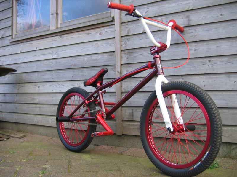 my bmx, now with black rear tire, less stickers and 2 G-Sport Plegs