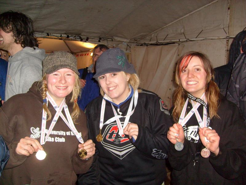 showin off our medals! awesome weekend but seriously awful weather!