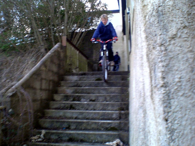 sam about to ride down some steps
