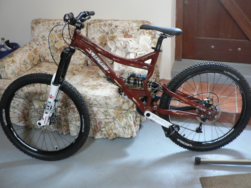 My new specialized sx trail with 66s, ltd edition raceface cranks and a avid code on front