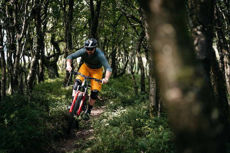 The UK influenced Merida Big.Trail 600 being ridden on the trails that inspired its creation.