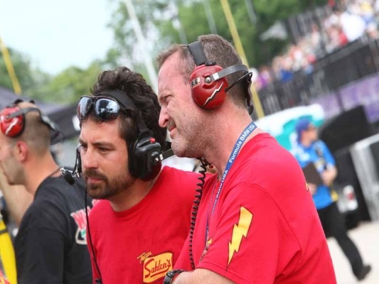 me (on the right) watching the telemetry at the Detroit GP