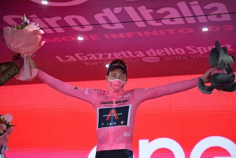 Tao Geoghegan Hart (Ineos Grenadiers) claimed overall victory at the 2020 Giro d’Italia, beating overnight race leader Jai Hindley (Sunweb) by 39 seconds in the stage 21 time trial in Milan.

The pair had entered the final day tied on time – a first in Grand Tour history – but Geoghegan Hart made his superior time trialling pedigree count on the flat 15.7km course into the heart of Milan.

The 25-year-old clocked 18:14, punching the air as he watched Hindley exceed his time while still stuck in the final kilometre. Hindley gave his all to the line and stopped the clock on 18:53 to take second place on the final podium, ahead of his Sunweb teammate Wilco Kelderman.

It was a double celebration for Ineos Grenadiers, as time trial world champion Filippo Ganna claimed the stage win, making it a clean sweep of the three time trials at this Giro, and four stage wins in total. Ineos themselves have now won seven of the 21 stages and the overall title, all after losing their leader Geraint Thomas on stage 3.

https://www.cyclingnews.com/races/giro-d-italia-2020/stage-21/results/