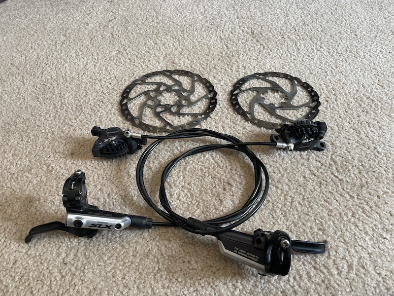 slx four piston brakes